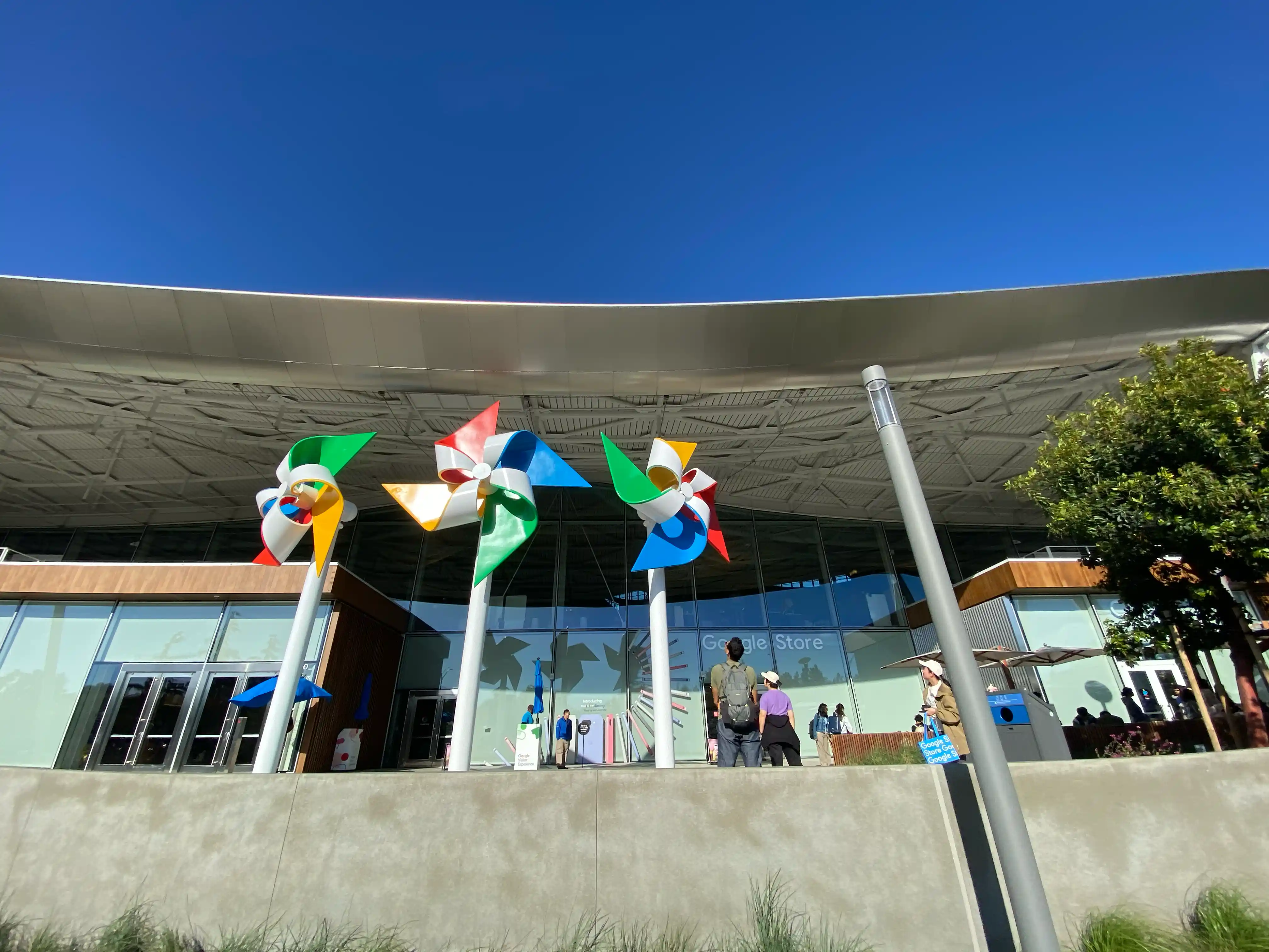 In the background, three windmill objects in Google's colors stand, with an entrance labeled "Google Store" behind them